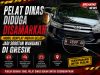 Pelat Dinas Diduga Disamarkan, Mobil Berplat Merah Gelap Jadi Sorotan Warganet di Gresik